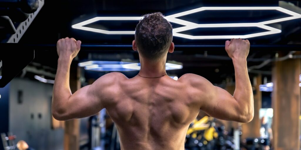 man-doing-pushups-gym-sports-lifestyle